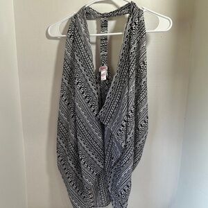 Justice open front sleeveless vest size m/l